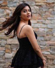 Stylish Amritha Aiyer in a Black Printed Dress Photos 02