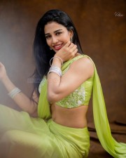 Stylish Daksha Nagarkar in a Green Saree Photos 01