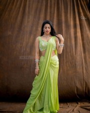 Stylish Daksha Nagarkar in a Green Saree Photos 02