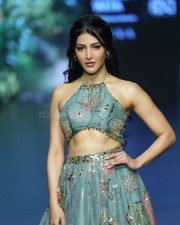 Stylish Shruti Haasan in a Cyan Colored Halter Neck Crop Top with a Matching Floral Skirt Pictures 04