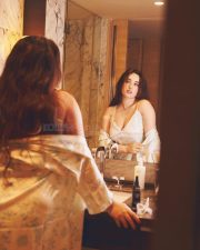 Tempting Nepali Actress Aditi Budhathoki in a White Floral Satin Lace Trimmed Camisole with a Matching Ruffle Shorts Photos 04