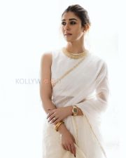 Timeless Actress Nayanthara in a White Saree with Gold Border Photos 03