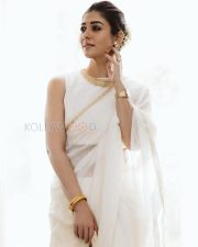 Timeless Actress Nayanthara in a White Saree with Gold Border Photos 04