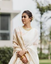 Timeless Actress Nayanthara in a White Saree with Gold Border Photos 05