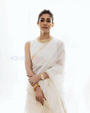 Timeless Actress Nayanthara in a White Saree with Gold Border Photos 06