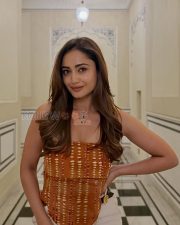 Vibrant Actress Tridha Choudhury in a Rust Orange Printed Strapless Top and White Pants Photos 04 Vibrant Actress Tridha Choudhury in a Rust Orange Printed Strapless Top and White Pants Photos 04