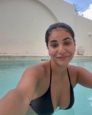 Alluring Actress Radhika Seth in a Black Bikini at Poolside Photos 01