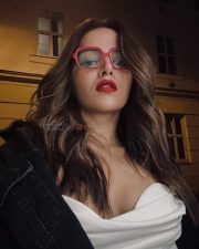 Bhooth Bangla Heroine Wamiqa Gabbi in a Strapless Silk Top with a Draped Cowl Neckline and Oversized Black Denim Jacket Photos 02