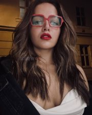 Bhooth Bangla Heroine Wamiqa Gabbi in a Strapless Silk Top with a Draped Cowl Neckline and Oversized Black Denim Jacket Photos 03