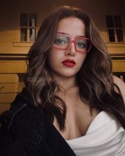 Bhooth Bangla Heroine Wamiqa Gabbi in a Strapless Silk Top with a Draped Cowl Neckline and Oversized Black Denim Jacket Photos 04