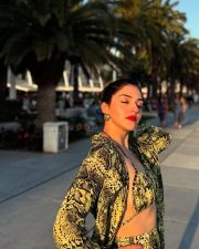 Bold Mehreen Pirzada in a Yellow and Black Halter Top and Shorts with a Loose Skirt Pictures 08