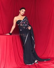 Captivating Wamiqa Gabbi in a Black Saree with Butterfly Motifs Photos 05