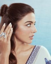 Charming Wamiqa Gabbi in a White Saree with Blue Butterfly Print and Navy Blue Blouse Photos 02