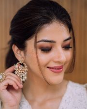 Cute Mehreen Pirzada in a White Lace Dress Pictures 01