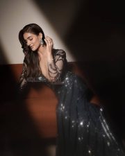 Dazzling Actress Mukti Mohan in a black and teal sequined striped crop top with intricate beadwork photos 04