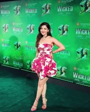 Elegant Actress Mehreen Pirzada in a red saree with gold embroidery Photos 04