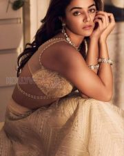 Gorgeous Wamiqa Gabbi in a Beige Lehenga with a Deep V Neckline Photos 02