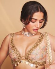 Graceful Actress Wamiqa Gabbi in a Blush Pink Floral Embroidered Lehenga Photos 02