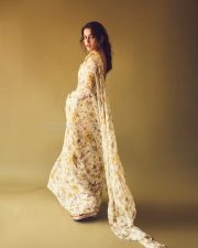 Graceful Wamiqa Gabbi in a Pastel Floral Saree with a Ruffled Off Shoulder Blouse Pictures 03