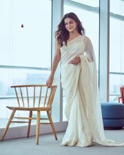 Graceful Wamiqa Gabbi in a White Chikankari Embroidered Saree Floral Border with Matching Sleeveless White Blouse 02