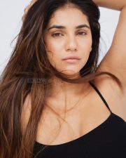 Innocent Beauty Radhika Seth in a Black Spaghetti Top and Blue Jeans Photos 03