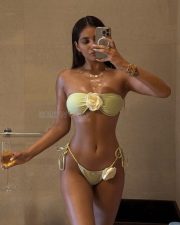 Irresistible Erotic Beauty Radhika Seth in a Two Piece Micro Bikini Photos 01