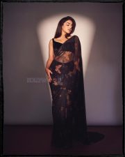 Mesmerizing Wamiqa Gabbi in a Black Butterfly Sheer Saree with a Black Sleeveless Blouse Pictures 01