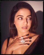 Mesmerizing Wamiqa Gabbi in a Black Butterfly Sheer Saree with a Black Sleeveless Blouse Pictures 02