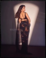 Mesmerizing Wamiqa Gabbi in a Black Butterfly Sheer Saree with a Black Sleeveless Blouse Pictures 03