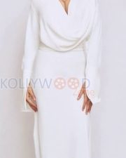Polished Actress Wamiqa Gabbi in a White Draped Long Sleeve Dress Photos 02