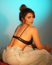 Reality Ranis of the Jungle Tejaswi Madivada in a Black Lace Triangle Bralette and High Waisted Denim Shorts Photos 07