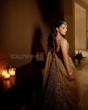 Resplendent Actress Mehreen Pirzada in a Gold Embroidered Bridal Lehenga Photos 01