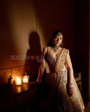 Resplendent Actress Mehreen Pirzada in a Gold Embroidered Bridal Lehenga Photos 04