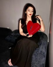 Sexy Mehreen Pirzada in a Black Cleavage Dress and Red Lipstick Photos 01