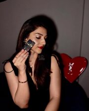 Sexy Mehreen Pirzada in a Black Cleavage Dress and Red Lipstick Photos 03