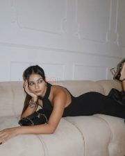 Sexy Radhika Seth in a Black Sleeveless Ruffles Maxi Dress Photos 04