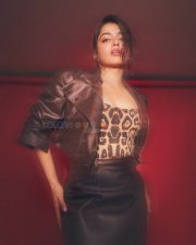 Striking Actress Wamiqa Gabbi in a Brown Leather Jacket Leopard Top Photos 02