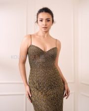 Striking Mahima Makwana Cleavage in a Gold Metallic Crochet Dress Photos 02