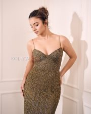 Striking Mahima Makwana Cleavage in a Gold Metallic Crochet Dress Photos 03
