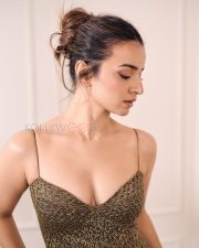 Striking Mahima Makwana Cleavage in a Gold Metallic Crochet Dress Photos 09