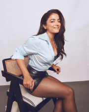 Striking Wamiqa Gabbi Legs in a Light Blue Shirt and Black Leather Skirt Photos 06