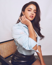 Striking Wamiqa Gabbi Legs in a Light Blue Shirt and Black Leather Skirt Photos 07