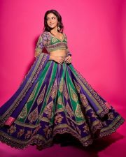 Stylish Wamiqa Gabbi in a Purple Embroidered Round Neck Lehenga Set Photos 01