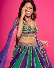 Stylish Wamiqa Gabbi in a Purple Embroidered Round Neck Lehenga Set Photos 02