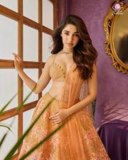 Actress Krithi Shetty in a Sleeveless Peach Embellished Lehenga with a Flared Skirt Photos 02 Actress Krithi Shetty in a Sleeveless Peach Embellished Lehenga with a Flared Skirt Photos 02