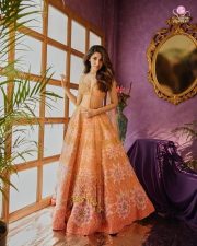 Actress Krithi Shetty in a Sleeveless Peach Embellished Lehenga with a Flared Skirt Photos 07