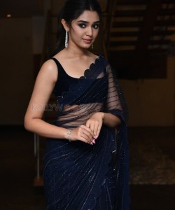 Actress Krithi Shetty in a Transparent Black Saree at at Macherla Niyojakavargam Pre Release Event Photos 04