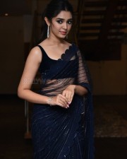 Actress Krithi Shetty in a Transparent Black Saree at at Macherla Niyojakavargam Pre Release Event Photos 04
