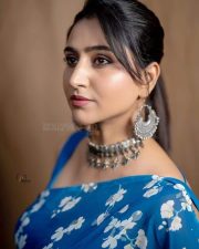 Actress Varshini Sounderajan in a Blue Floral Printed Saree with a Sleeveless Blouse Photos 02