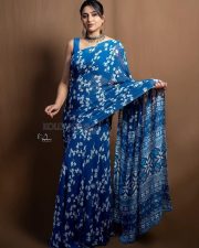 Actress Varshini Sounderajan in a Blue Floral Printed Saree with a Sleeveless Blouse Photos 03